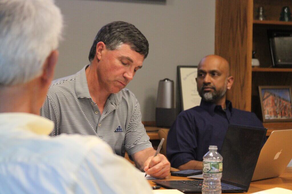 Financial Audit Advisory Committee Chair Cameron McKennitt takes notes during a June meeting. Photo: Dakota Antelman/The Acton Bridge