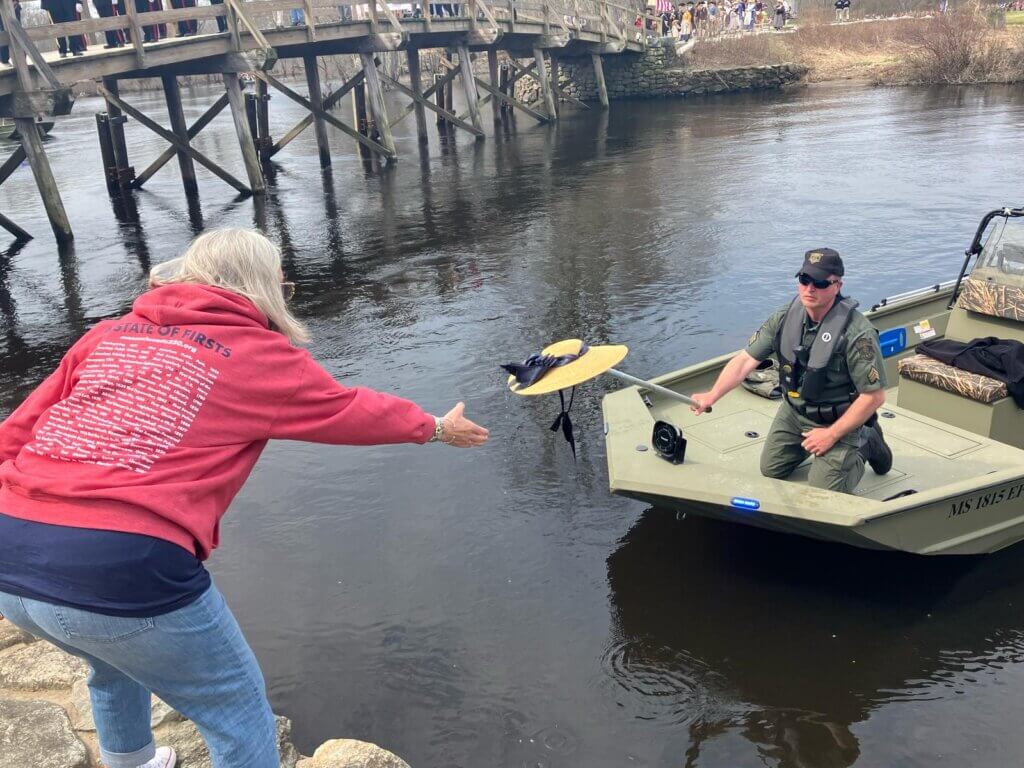 A dramatic hat rescue at North Bridge. Photo: Dakota Antelman/The Acton Bridge