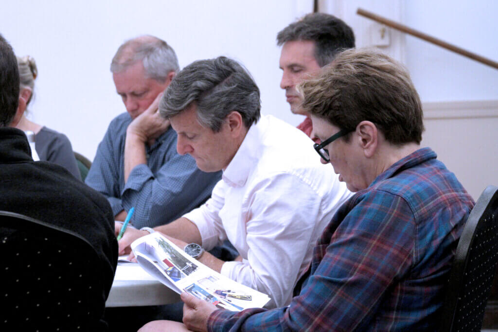Select Board member Mary Hartman reviews a planning memo regarding the proposed Maisey O’Donnell Dryland Training Room. Photo: Dakota Antelman/The Acton Bridge
