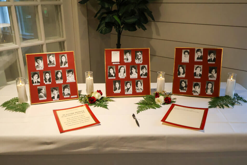 A memorial table honors Acton-Carlisle High School classmates who have died since graduating with the class of 1976. Photo by Kallejay Terrelonge