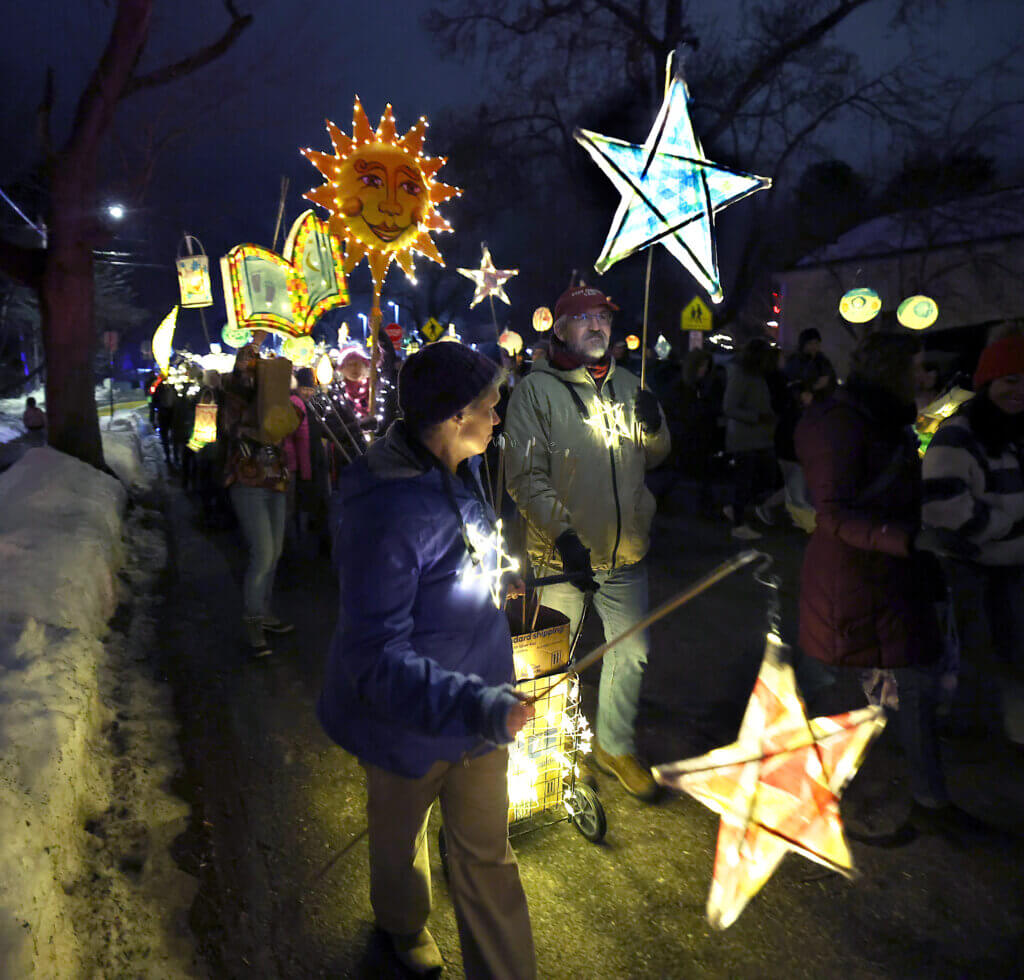 The parade marches down Stow Street in Acton Center. 
