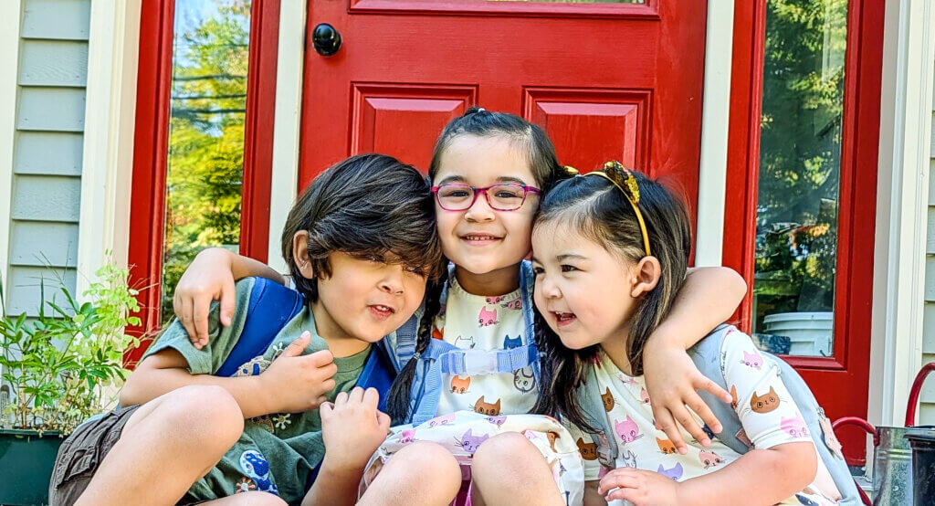 The Powers siblings were excited for their first day of school. From left, Ronan, 5, is a kindergartener at Acton Montessori; Ivy, 6, is starting first grade at Alcott Elementary; and Zoe, who is soon to turn 3, begins preschool at Acton Montessori.  
