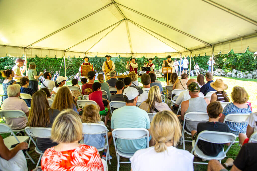 Shade, hydration, and air circulation helped with the day’s oppressive heat.
