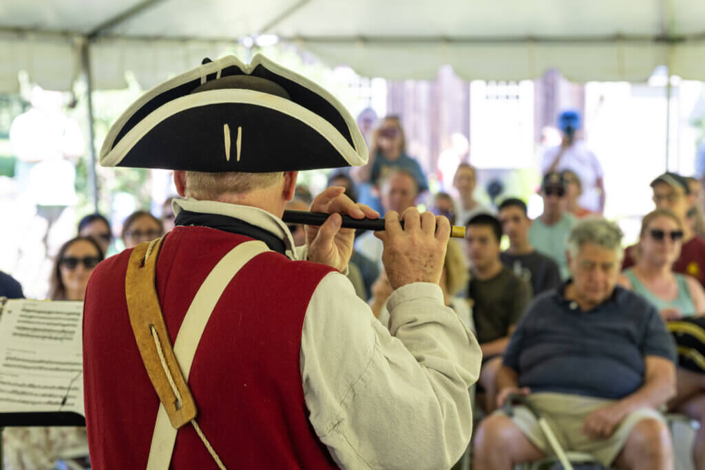 Fife and Drum members including Jay Powers didn’t forgo the Colonial garb despite the sweltering heat. 
