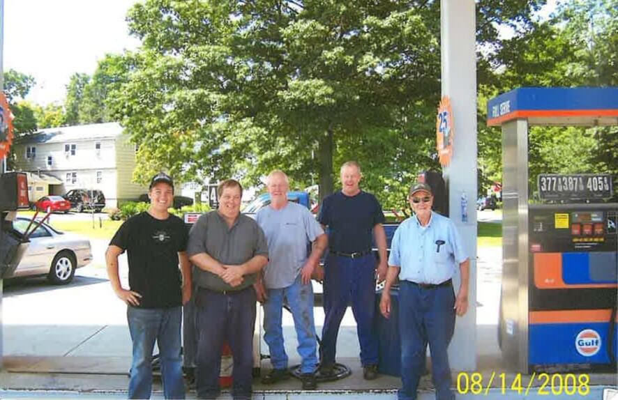 Left to right: Joe Soberg’s son Taylor, Joe, Bill, Dana, and father Howie in 2008. Note the price of gas. Courtesy photo