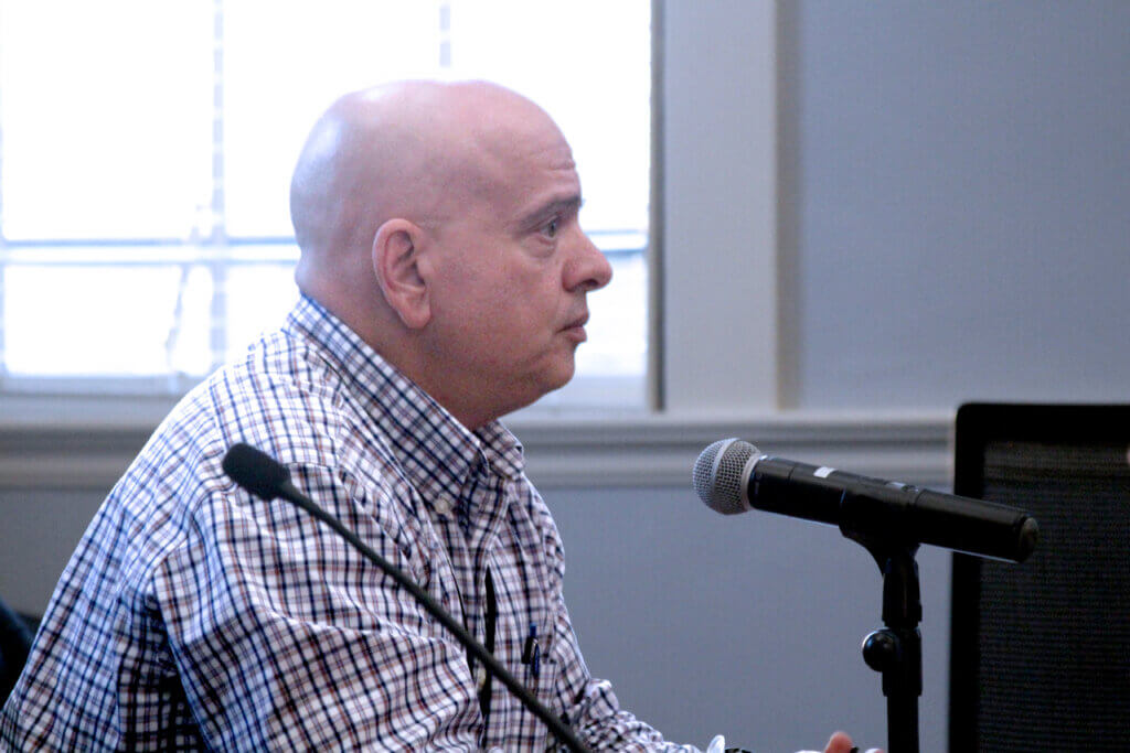 Chief financial officer Anthony Ansaldi listens during a May 12 Select Board meeting. Photo: Dakota Antelman/The Acton Bridge