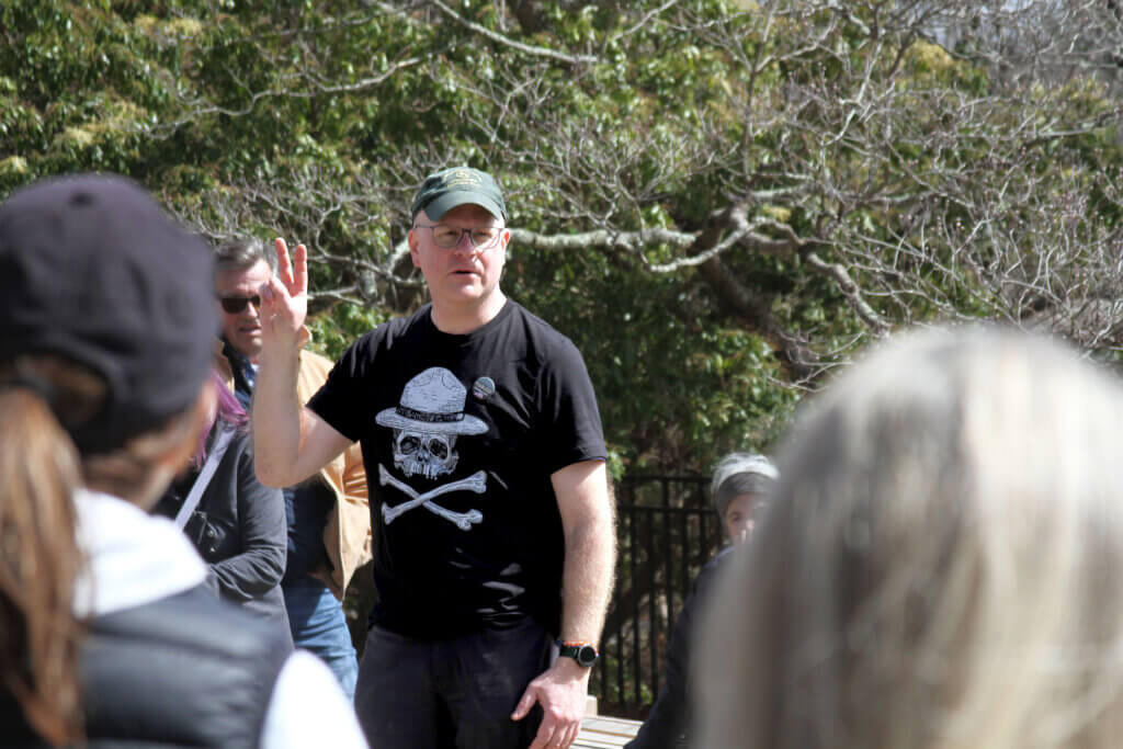 Former National Park Service ranger Eric Bright speaks at a March 22 rally at Minute Man National Historical Park. Photo: Dakota Antelman/The Acton Bridge