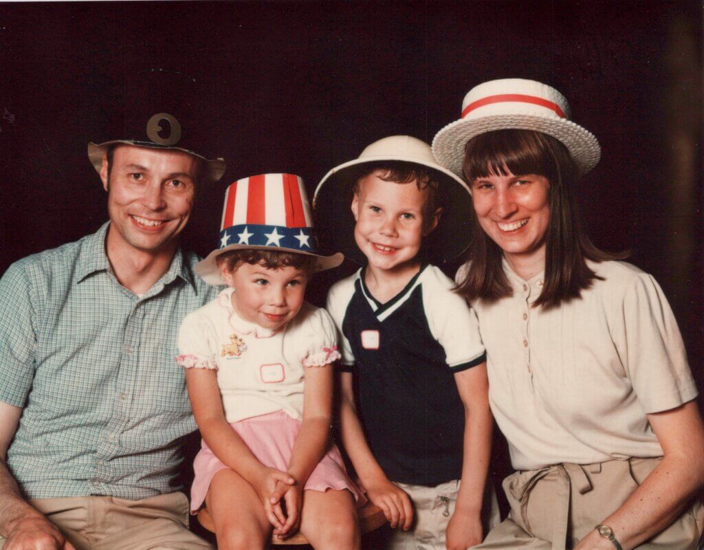 Funny hats were the dress code for a Fourth of July celebration in 1986 for Alan and Lois Anne Whitney and their children, Sarah and Eric. Courtesy photo