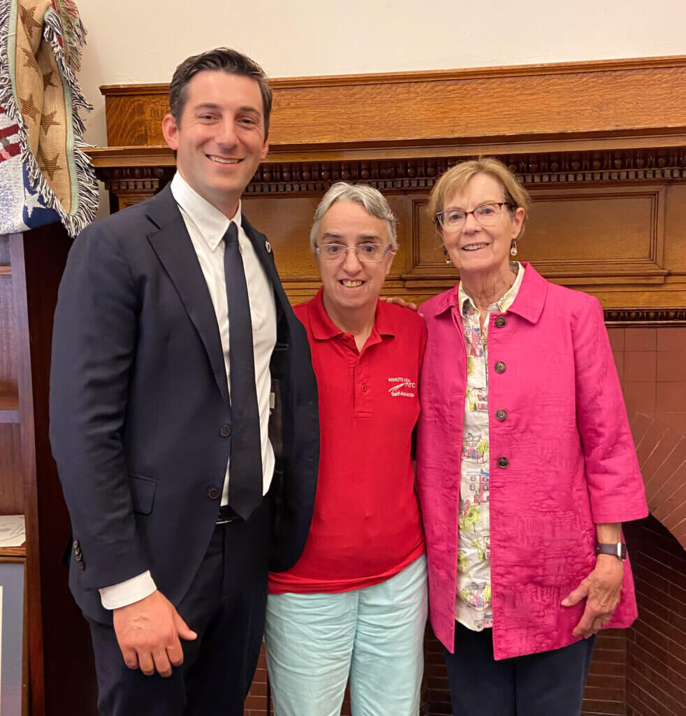 Jean Goldsberry (right) with Minute Man Arc Board Member Janice Smith (center) and state Rep. Simon Cataldo at the State House. Courtesy photo