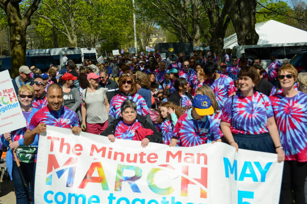 Jean Goldsberry (right) leads walkers in the Minute Man March fundraising event in 2019. Courtesy photo