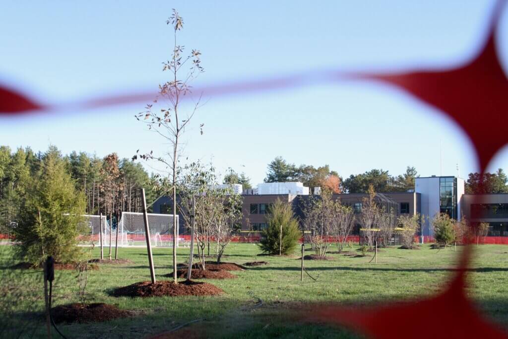 Temporary orange fencing is one of the last remaining signs of construction on the new Ellen Garrison Building at Acton Middle School campus. Photo: Dakota Antelman/The Acton Bridge