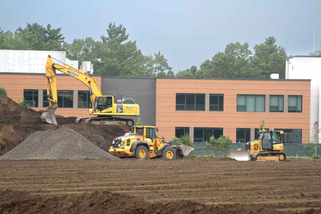 Heavy machines moved dirt on soon-to-be completed CMS athletic fields in late July. Photo: Dakota Antelman/The Acton Bridge
