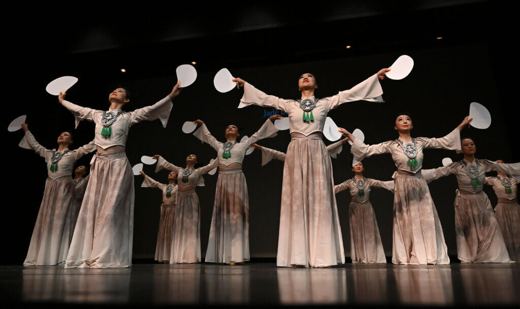 Dancers from the Dongfang Dance Troupe perform their “Jade Bird Dance” in the CCHS auditorium.