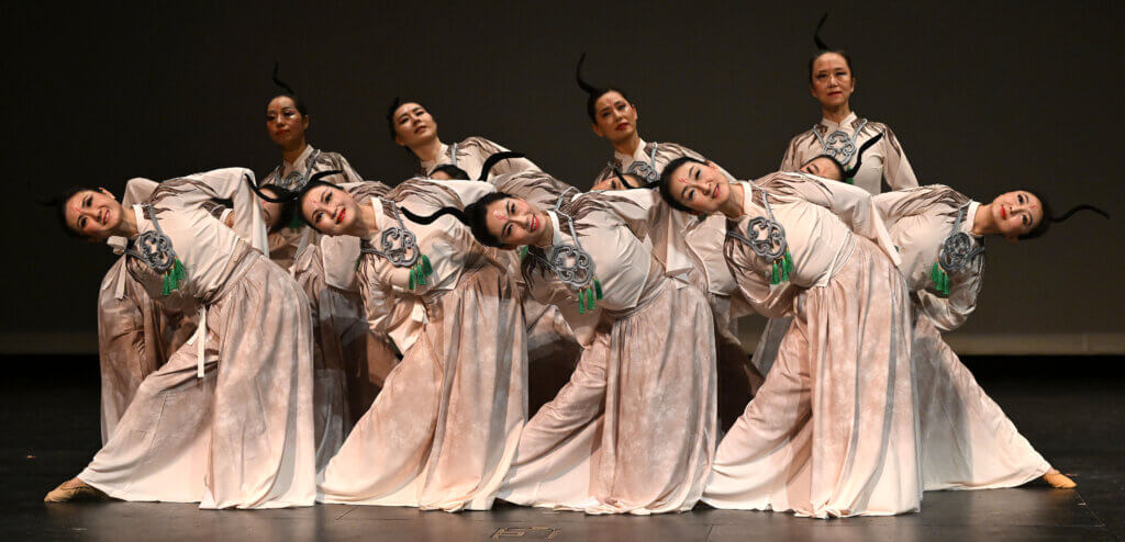 Performers from the Dongfang Dance Troupe start their “Jade Bird Dance”