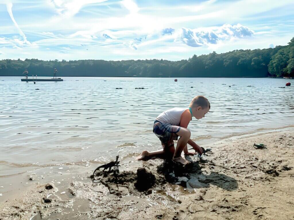 Vaughn Emley enjoys classic Acton summer moments at White Pond. Photo by Elisabeth Weber