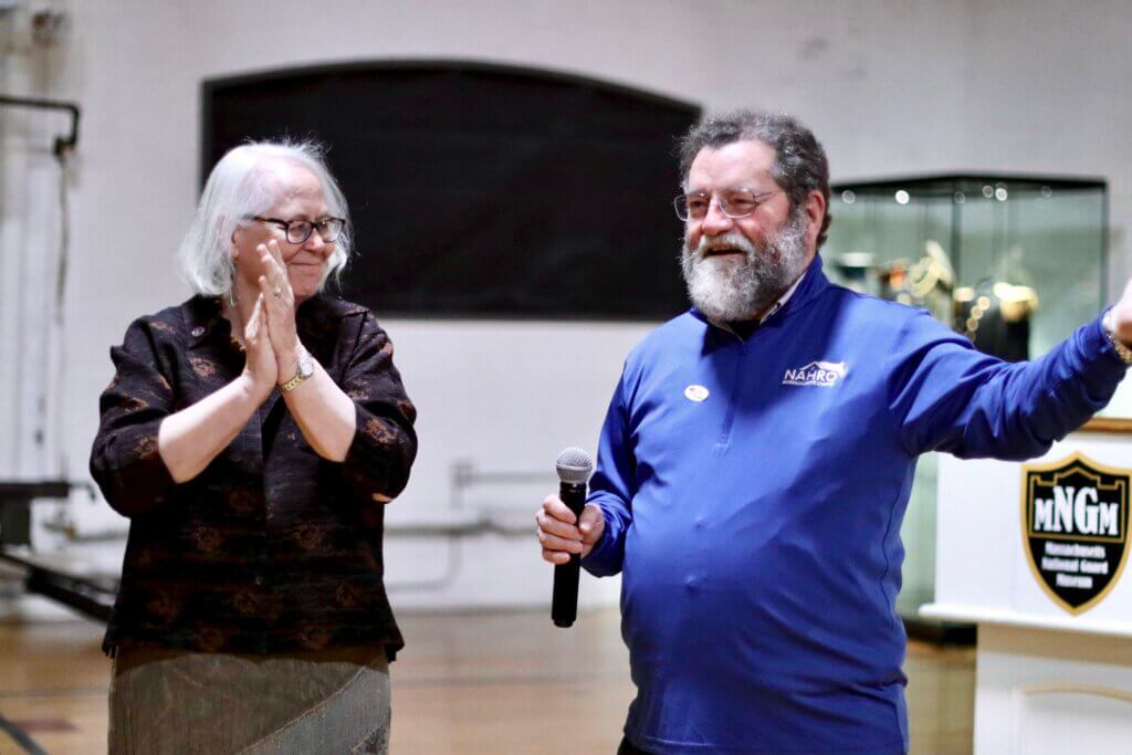 Town Moderator-elect Karlen Reed applauds after Housing Authority incumbent Stephan Bader says, "This is what democracy looks like” in their joint victory speech. Both ran unopposed. Photo: Trace Salzbrenner/The Acton