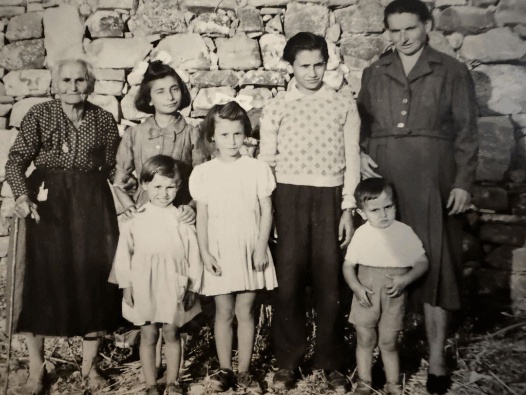Nicoletta at 15, third from right, with his mother, grandmother, and four siblings, in Aquara, Italy. Courtesy photo