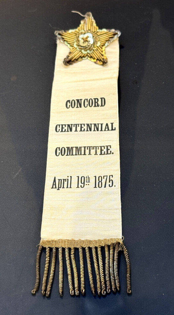 A ribbon worn by a committee member in 1875. Image courtesy of Special Collections, Acton Free Public Library