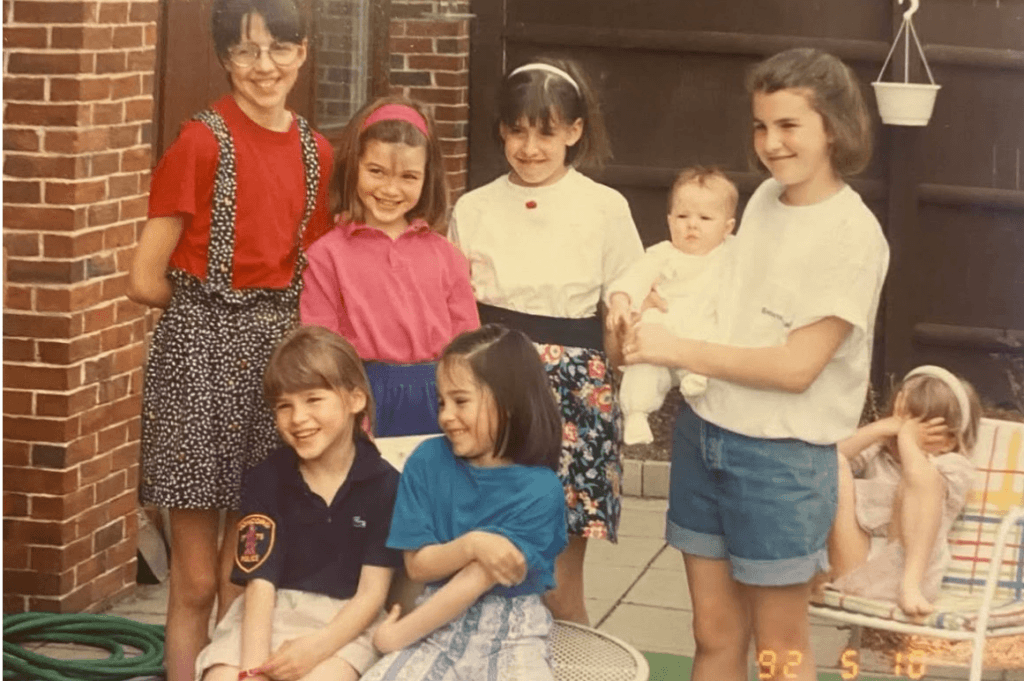 A young Sanna McAuliffe (in blue shirt) with her two sisters and cousins on Keyes Road. Courtesy photo