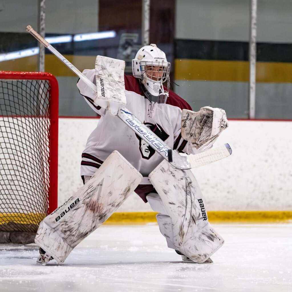 Goalie Max Furman kept the Patriots in the game, turning away 25 of 26 Boston Latin shots to enable a CCHS comeback and rack up his first varsity win of the season. Photo by Aidan Moroney