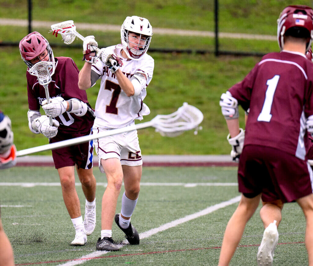 Acton-Carlisle captain Taylor Ladd (No. 7) shoots against the Belmont Marauders. Photo by Jon Straggas