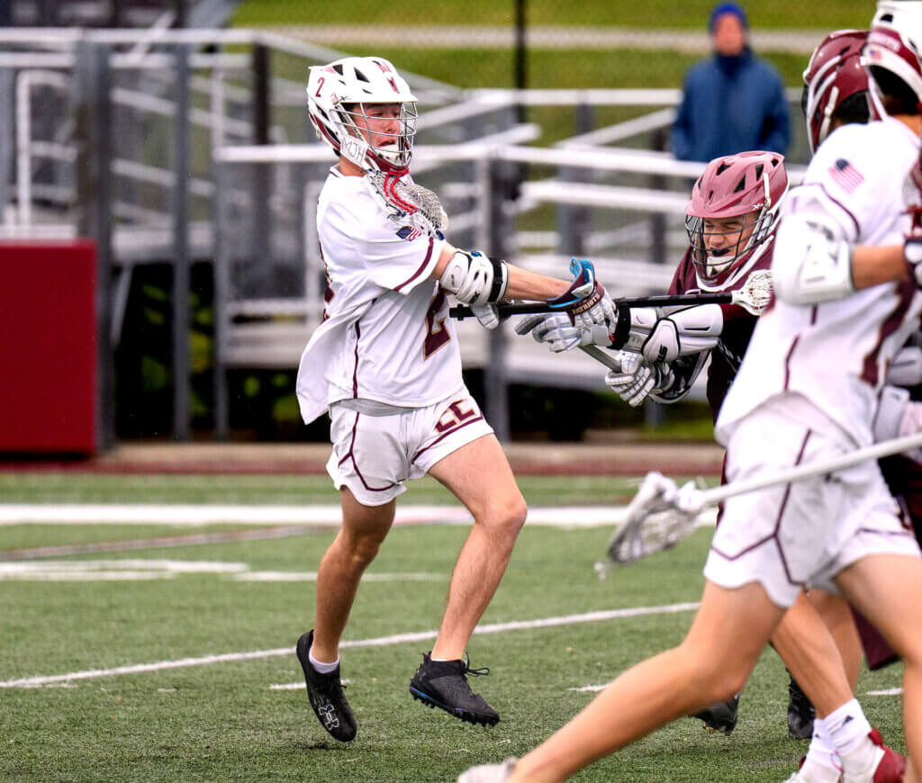 Acton-Carlisle captain Eric Palmer (No. 2) scores a goal against the Marauders. Photo by Jon Straggas