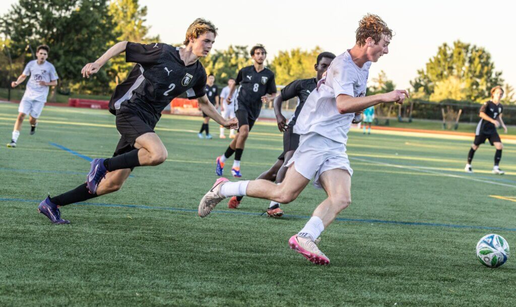 Joe Ferrari drives upfield against Cambridge Rindge & Latin on September 18. Photo by Rebecca Woodward