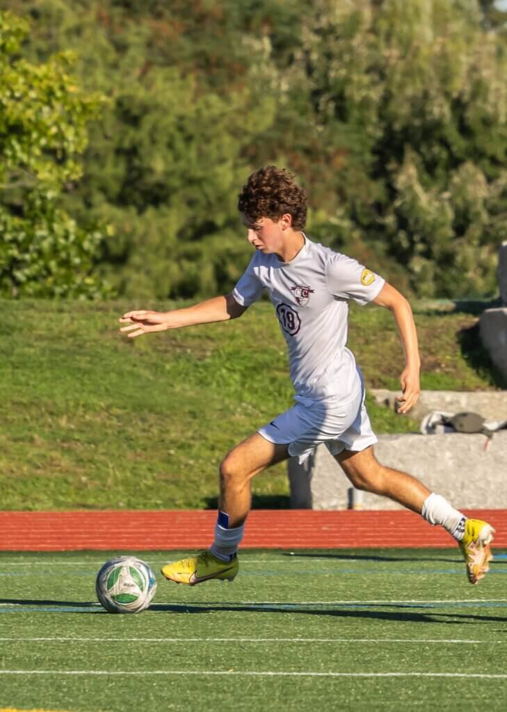 Owen Tompsett takes control against Cambridge Rindge & Latin on September 18. Photo by Rebecca Woodward