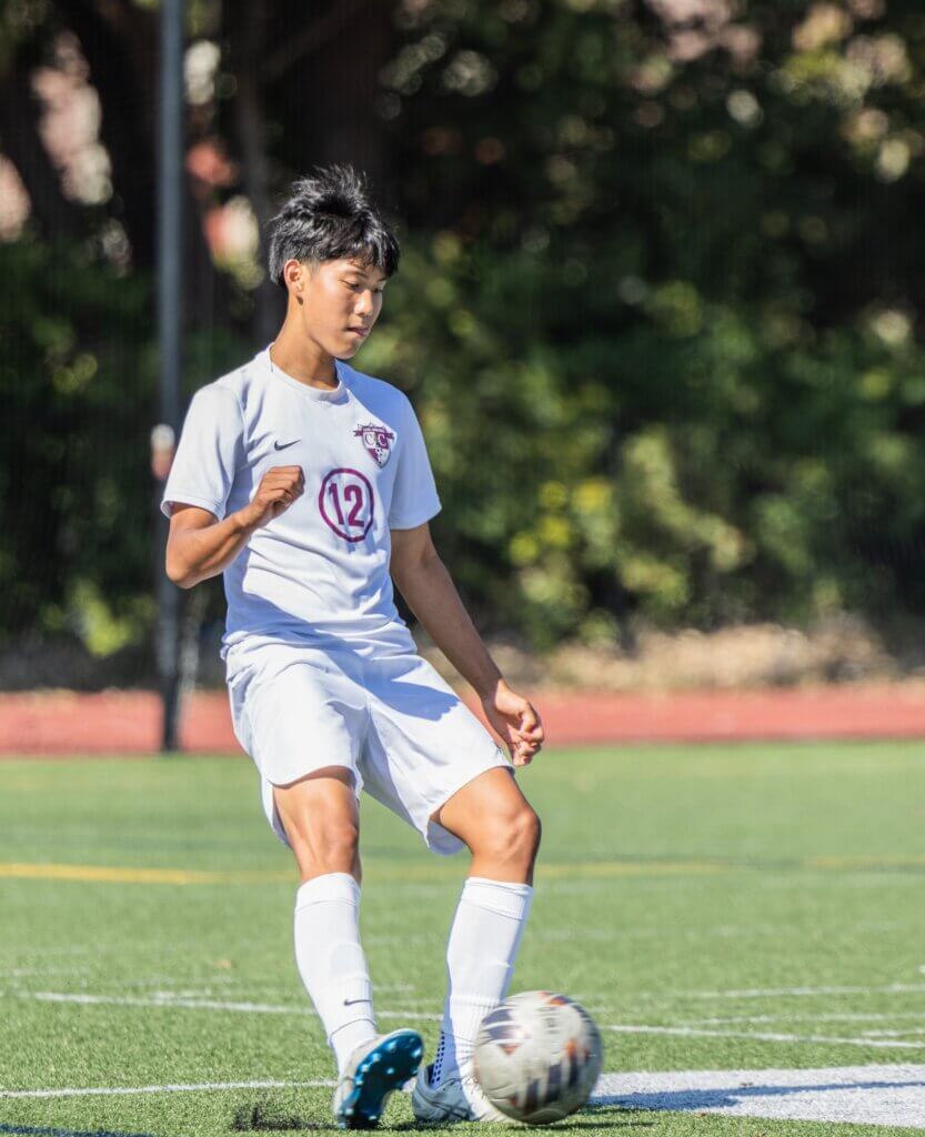 Noah Endo controls play against Dearborn STEM Academy. Photo by Rebecca Woodward