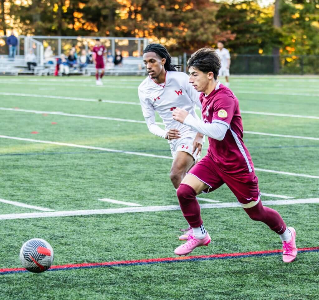 Harry Growney charges upfield. Photo by Rebecca Woodward