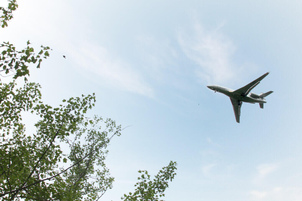 A jet streaks over Great Meadows National Wildlife Refuge near Hanscom Field. Photo: Dakota Antelman/The Acton Bridge