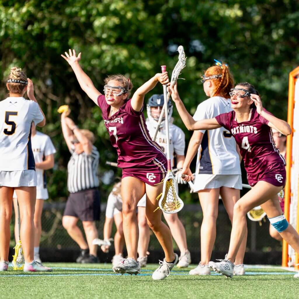 CCHS co-captain Sarah Fortier celebrates scoring the winning goal in sudden death overtime to give the Patriots their second straight MIAA Division 1 title on Wednesday. Photos by Aidan Moroney