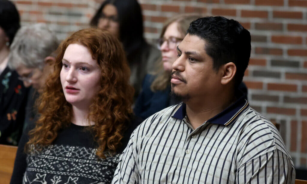 Danielle Vishlitzky, left, and husband Gerardo Zelaya in Acton District Court on Thursday, January 8, 2025, during Joshua Quimby’s sentencing. Photo: Ken McGagh/The Acton Bridge