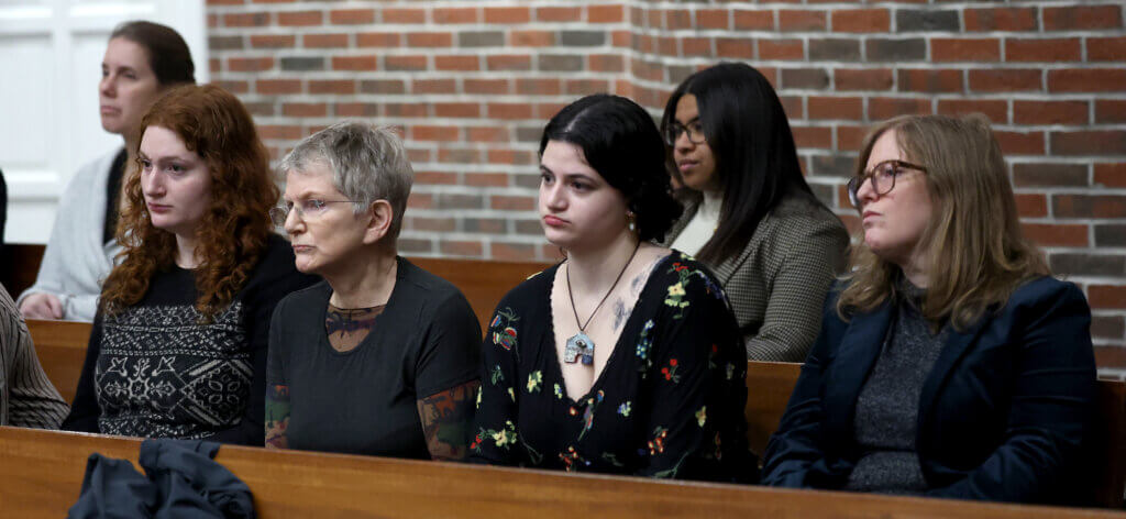Left to right: Tamar Vishlitzky’s daughter Danielle, mother Mareska, daughter Halle, and sister Ruthie listen to Thursday’s court proceedings. Photo: Ken McGagh/The Acton Bridge