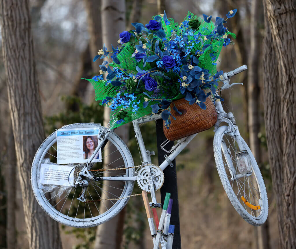A “ghost bike” memorial to Tamar Vishlitzky near the entrance to the Reformatory Branch Trail off Acton Road in Bedford. Photo: Ken McGagh/The Acton Bridge