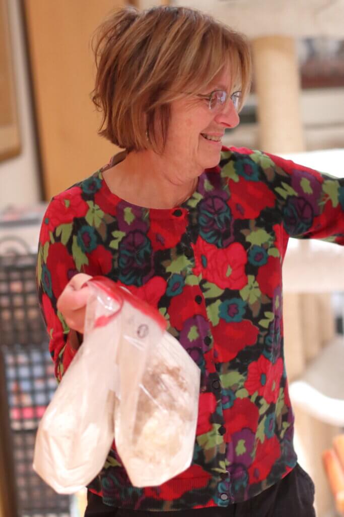 Andrea Resciniti usually has a few bags of dry ingredients left over after finishing the gingerbread house. She prepares 30 batches, and this year’s house took 27. Photo: Trace Salzbrenner/The Acton Bridge