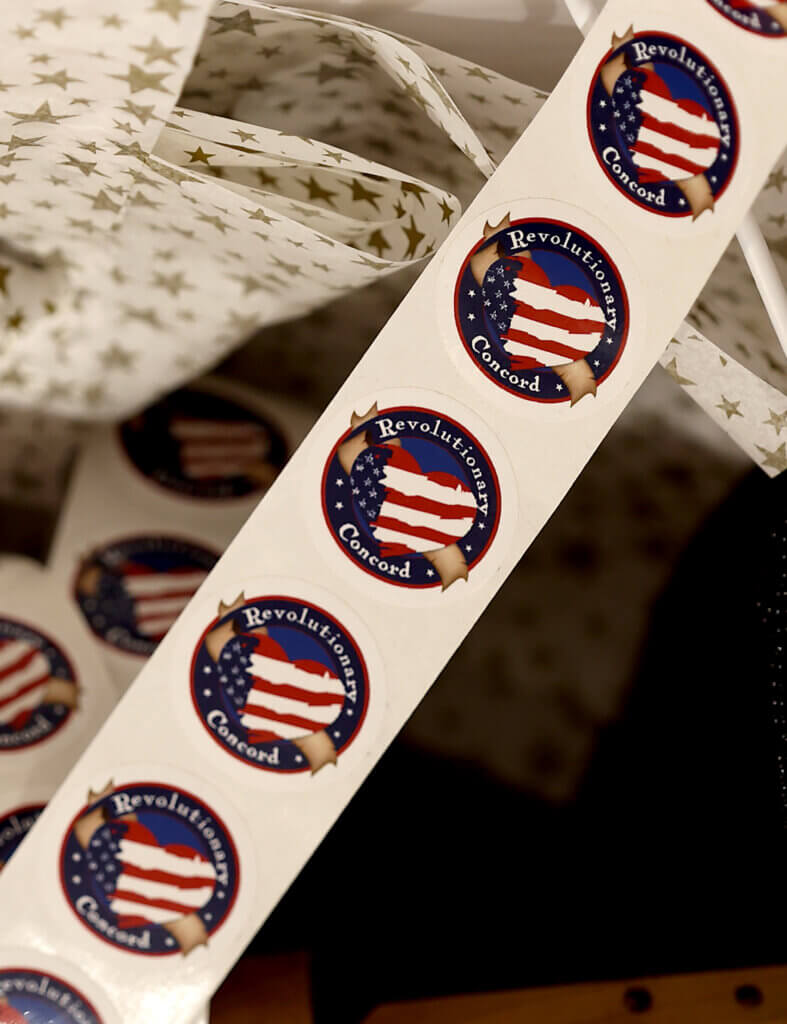 Stickers at the register at Revolutionary Acton on Saturday, September 6, 2025 Ken McGagh/The Acton Bridge