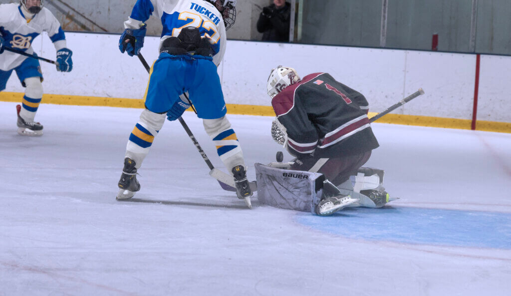 Jason Swaim makes a save in the shutout win. Photo by Leslie Bailey