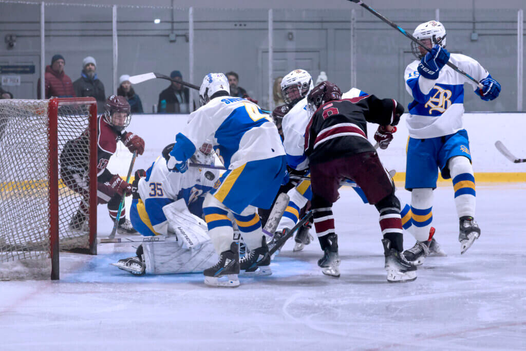 Declan Daley watches for the rebound after his shot on net. Photo by Leslie Bailey