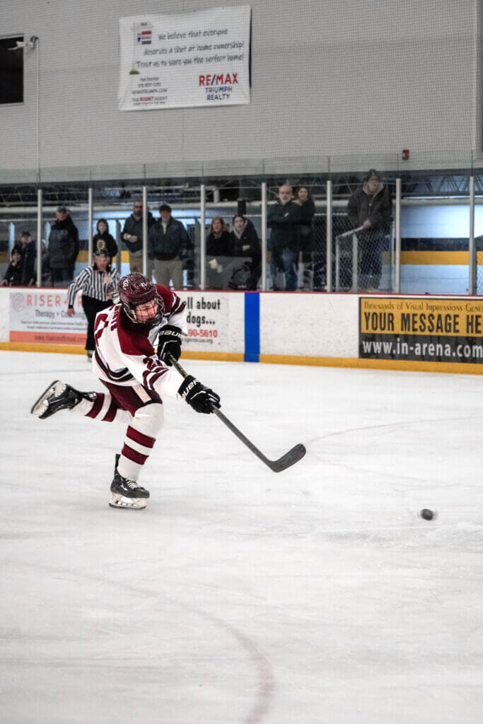Ben Ohanian shoots against Boston Latin. Photo by Aidan Moroney