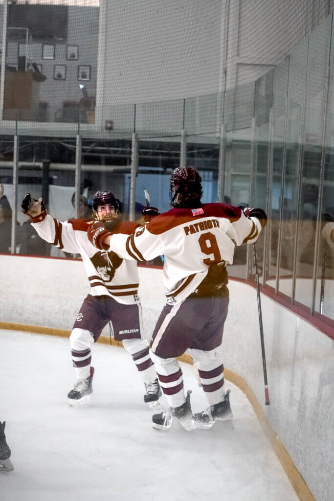Joe Grasso and Cam Doull celebrate after a goal. Photo by Aidan Moroney