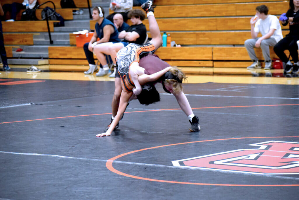 Jonathan Lucas dominates in a first period tech fall. Photo by Ted Myles