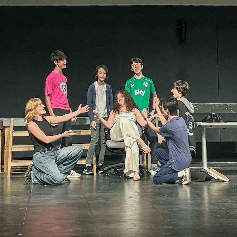 Cast members sing "One of the Boys," which helps launch Act II of “9 to 5.” Photo by Paloma Wigton