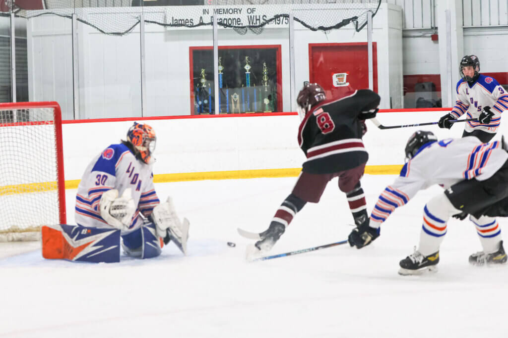 Declan Daley scores in the third period. Photo by Leslie Bailey
