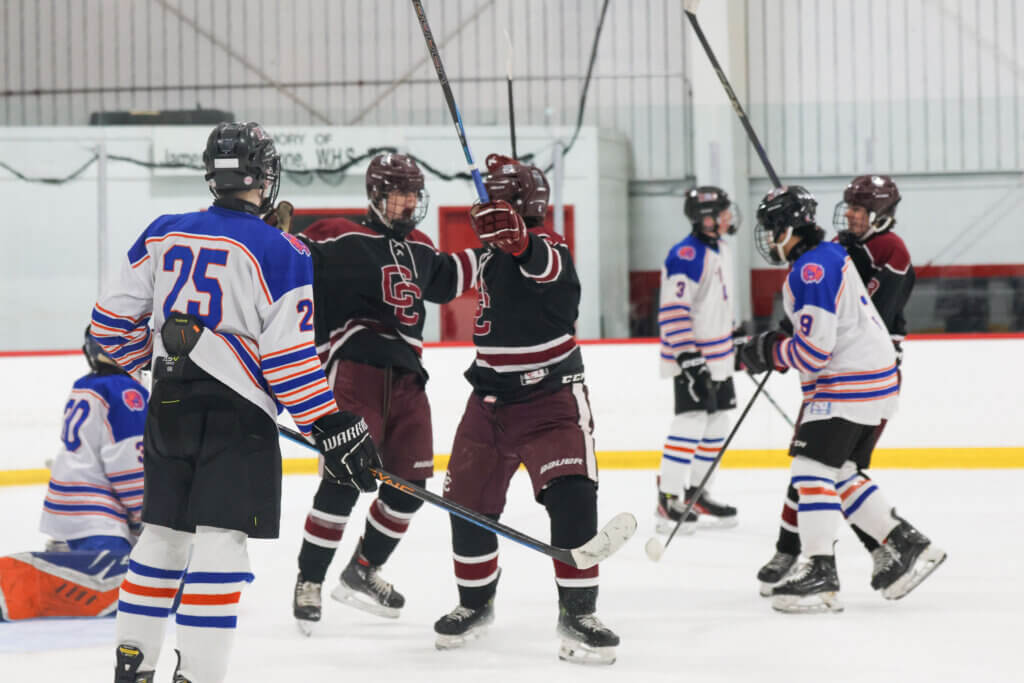 Henry Sullivan and Alex Fivek celebrate Sullivan’s goal. Photo by Leslie Bailey
