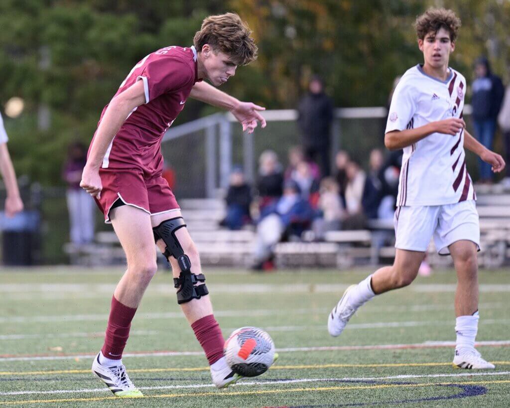 Tyler Shepard tallies a goal for a 3-0 lead over Westford Academy. Photo by Jon Straggas