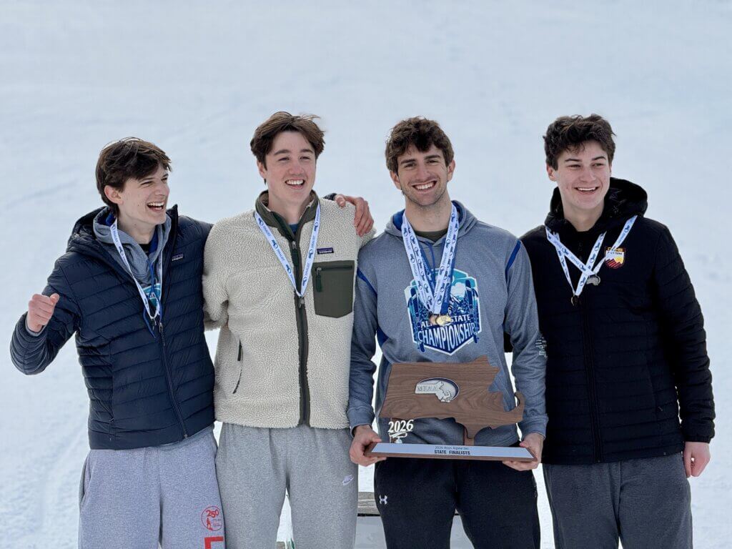 The Acton-Carlisle boys Alpine ski team won second place overall in the MIAA Alpine Skiing Championships, placing first among Massachusetts public schools. From left, Jakab Renyi, Will Redmond, Theo Remington, and Jamie Poole. Photo by Doug Remington