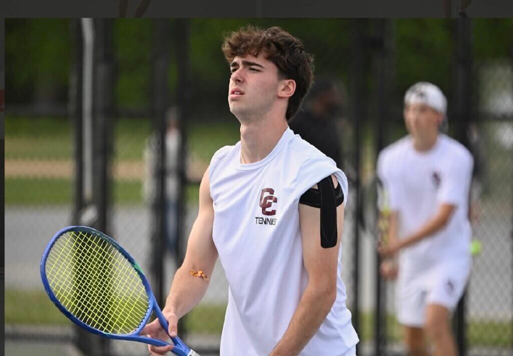 The Patriots first doubles team of Max Rottenberg, left, and Brooks Miller wait for the ball during their playoff match Thursday vs. Hopkinton. Photo by Alexis Guinebertiere