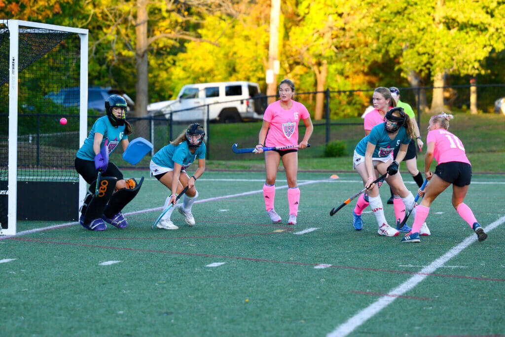 Lindsay Cain fires a goal to open the scoring in the first quarter of Acton-Carlisle’s Sticks for Cancer match against North Andover on October 3. Photo by David Clancy