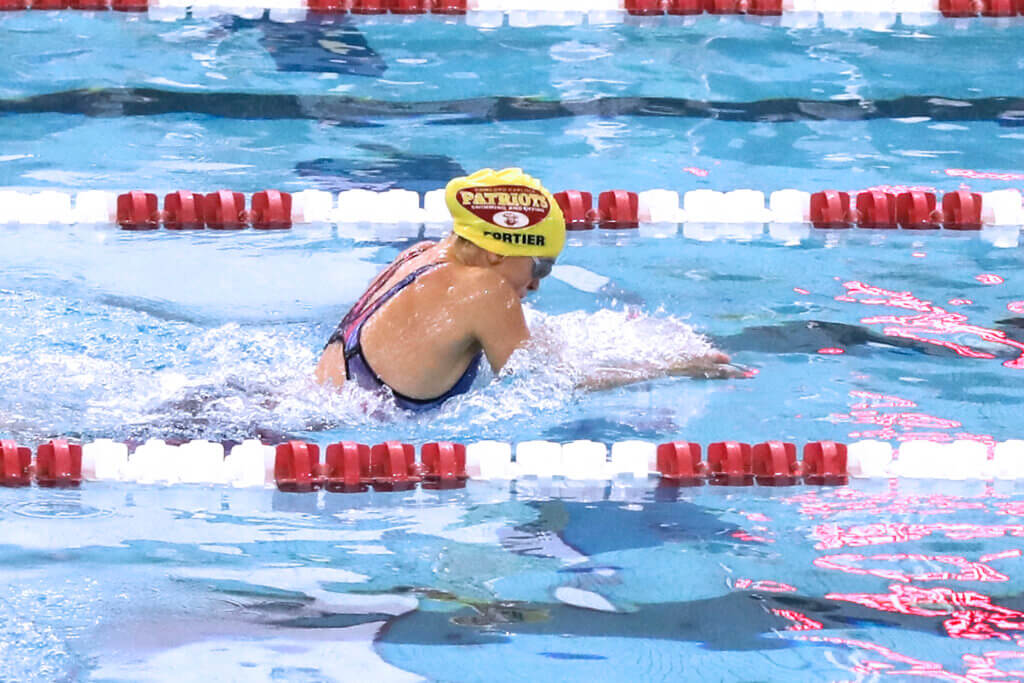 Sarah Fortier swimming the final lap of the 100-yard breaststroke. Photo by Kate Renyi

